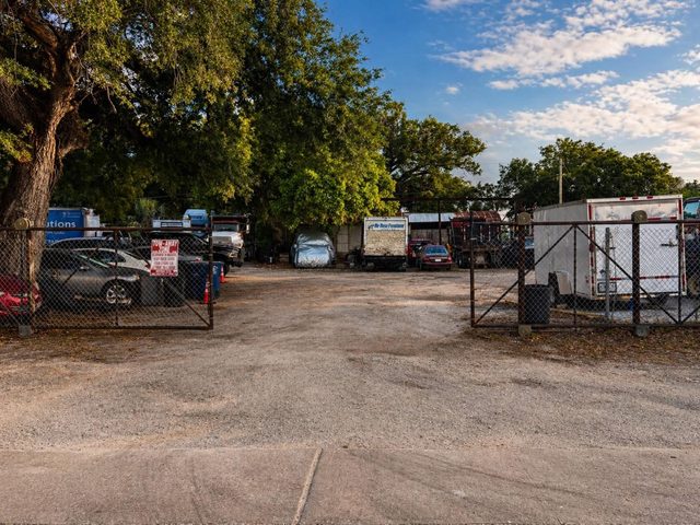 Open gate at the B.O.S. Trucking & Site secure truck parking lot in Fort Myers
